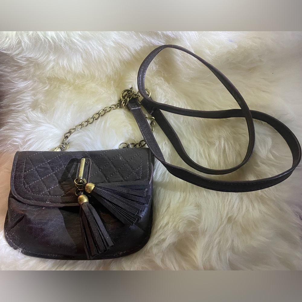 Bueno black clutch purse with tassels
